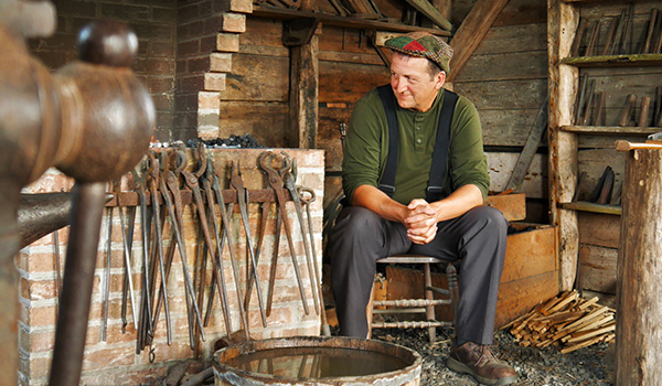 Blacksmith at the Le Village Historique Acadian de la Nouvelle-Écosse.