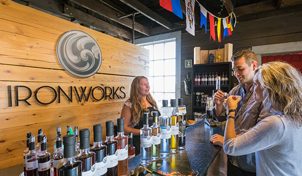 Two people having a tasting at the Ironworks Distillery